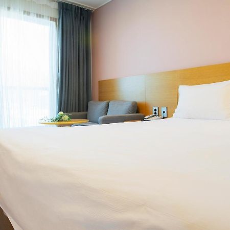 Sims Hotel Jeju Bagian luar foto